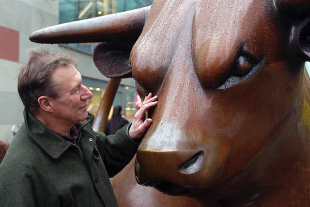 The late Laurence Broderick with his most famous sculpture - the iconic bull in Birmingham. He used to love going to the city incognito with his family to listen to visitors' comments