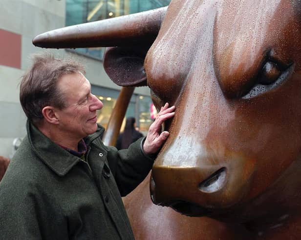 The late Laurence Broderick with his most famous sculpture - the iconic bull in Birmingham. He used to love going to the city incognito with his family to listen to visitors' comments