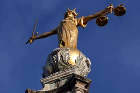 Statue of Justice above the Central Criminal Court building, Old Bailey in London.