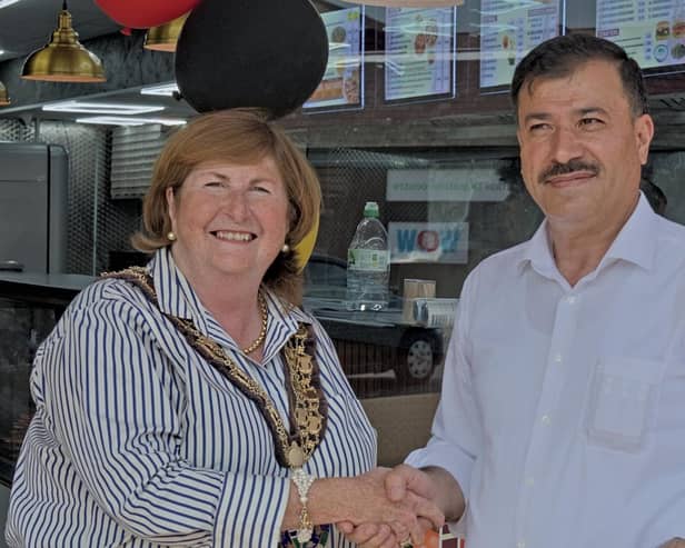 Sandy Town Mayor Joanna Hewitt with the owner Hilmi Sanci. Photo Neil Darlow