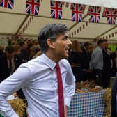 Prime Minister Rishi Sunak speaking with NFU President Tom Bradshaw at the Farm to Fork Summit.