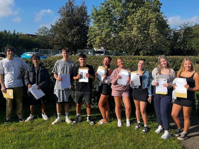 Students at Stratton Upper School with their A-level results. Pic supplied by Stratton Upper School