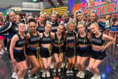 The Orion cheerleading team based in Biggleswade celebrate becoming division champions during a competition in Amsterdam