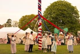 Adults dance round the Maypole. Pic: Willow Photography