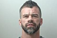 Joey Hoban, 34, from Blackpool, is wanted for an assault earlier this month where a man was punched and pushed to the floor. He is 5ft 8in tall, with a scarred face and tattoos.