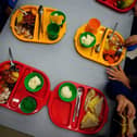 File photo of students eating their lunch in the school canteen.