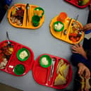 File photo of students eating their lunch in the school canteen.