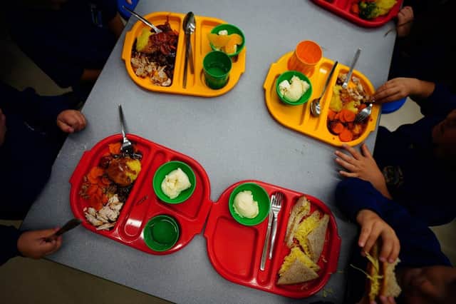 File photo of students eating their lunch in the school canteen.