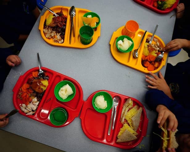 File photo of students eating their lunch in the school canteen.