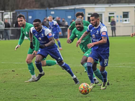 Leon Lobjoit chases the ball on his goalscoring debut against Biggleswade. Photo by Adrian Brown.