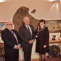 Outgoing mayor Cllr Martin Pettitt (centre) congratulates new deputy mayor Cllr Paul Sharman and mayor Cllr Joanna Hewitt.