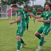 Biggleswade celebrate JJ Lacey's goal against Barton Rovers.