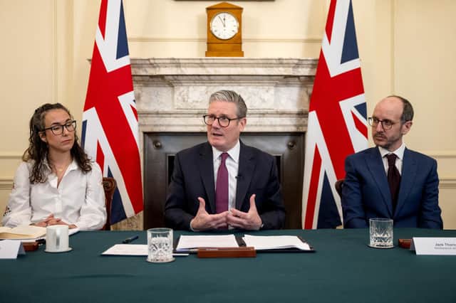 Prime Minister Keir Starmer holds a roundtable meeting with Sarah Simpkin from the Children's Society (L) and writer Jack Thorne (R) of Adolescence, inside 10 Downing Street on March 31, 2025 in London. Image: JACK TAYLOR/POOL/AFP via Getty Images.