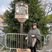Mayor Joanna Hewitt with the newly refurbished sign. Image: Sandy Town Council