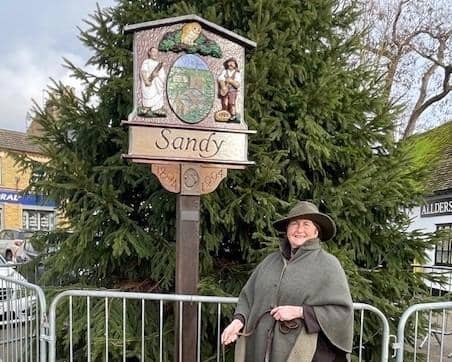 Mayor Joanna Hewitt with the newly refurbished sign. Image: Sandy Town Council