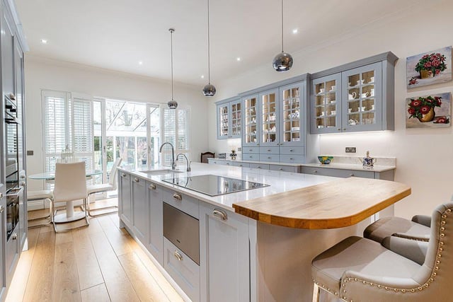 The bespoke kitchen by Jackton Moor comes with a large island.