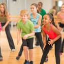File photo of children at a performing arts class.