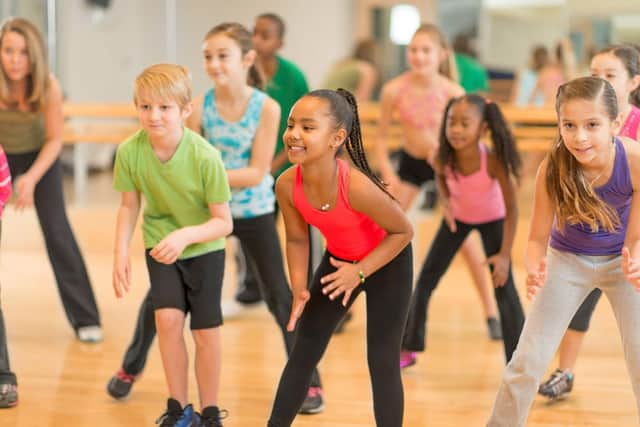 File photo of children at a performing arts class.