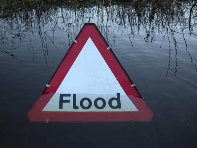 Flood alert. (Photo by Oli Scarff/Getty Images).