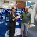 Geoff presenting a cheque to Tori Ablard, Regional Head of Hospice Fundraising at Sue Ryder St John's Hospice.