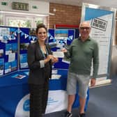 Geoff presenting a cheque to Tori Ablard, Regional Head of Hospice Fundraising at Sue Ryder St John's Hospice.