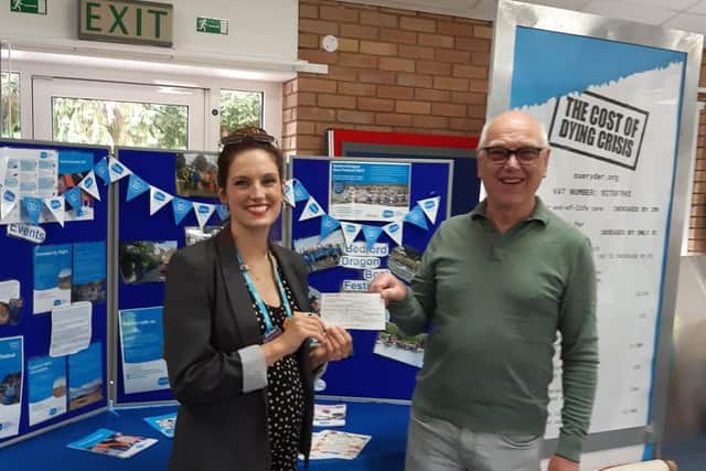 Geoff presenting a cheque to Tori Ablard, Regional Head of Hospice Fundraising at Sue Ryder St John's Hospice.