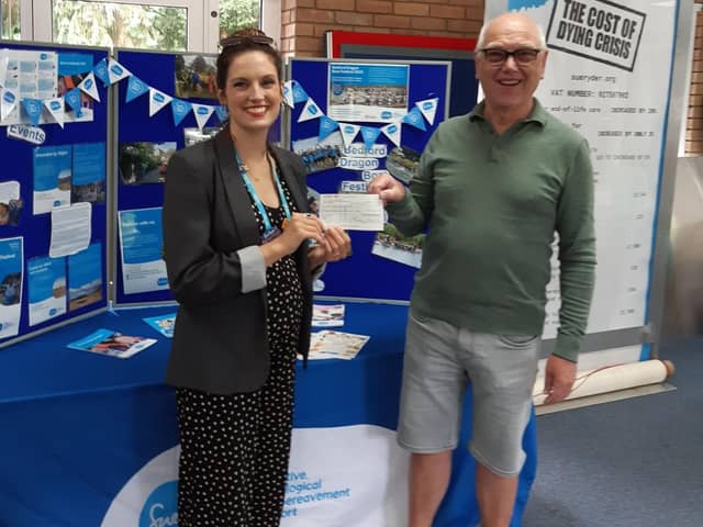 Geoff presenting a cheque to Tori Ablard, Regional Head of Hospice Fundraising at Sue Ryder St John's Hospice.