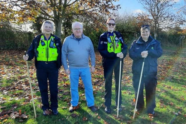 Ian Dalgarno (second from left) out with police and council officers on a weapons sweep this week.