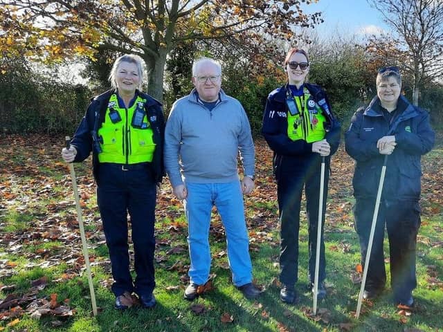 Ian Dalgarno (second from left) out with police and council officers on a weapons sweep this week.