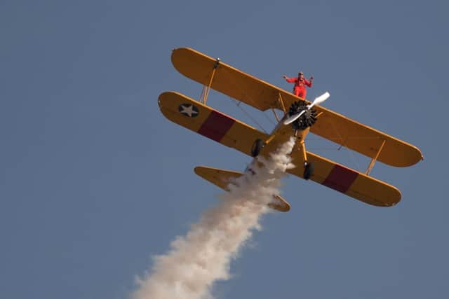 The pair will be wing-walking - just like Tom Lackey, 94, the world's oldest "wing-walker" (Photo credit should read Jorge Guerrero/AFP via Getty Images)