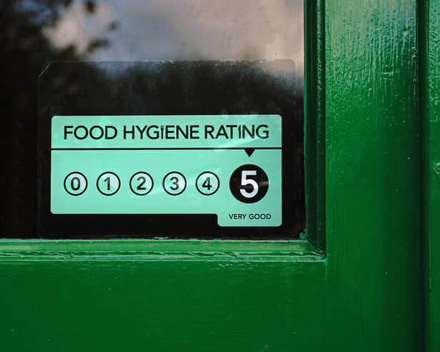 Food hygiene ratings sign in a door