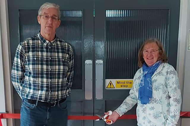 Melvyn and Wendy Robinson cut the ribbon