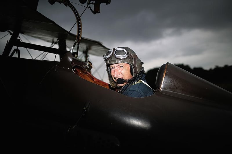 Shuttleworth Collection Pilot Rodger 'Dodge' Bailey prepares for a demonstration flight in a SE5a at 'The Shuttlesworth Collection' at Old Warden on July 21, 2014.