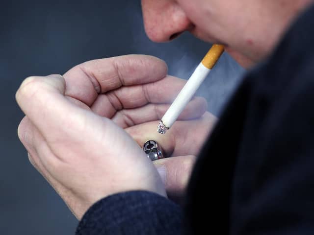 PICTURE POSED BY A MODEL File photo dated 12/03/13 of a man smoking a cigarette.