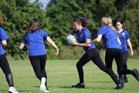 Pupils playing rugby at Stratton Upper School