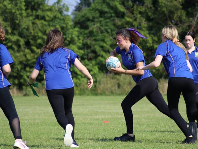 Pupils playing rugby at Stratton Upper School
