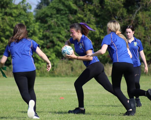 Pupils playing rugby at Stratton Upper School