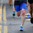 Stock picture of runners in action