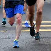 Stock picture of runners in action