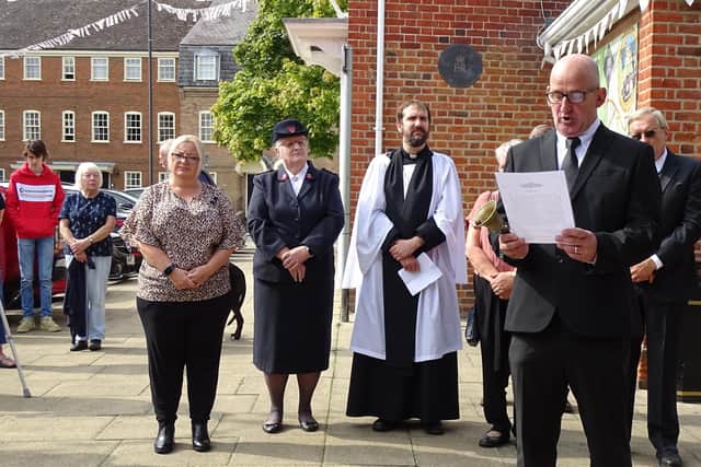Potton Official Town Crier Carlton Avison reads the Proclamation of Accession. Image: St Mary's Church.