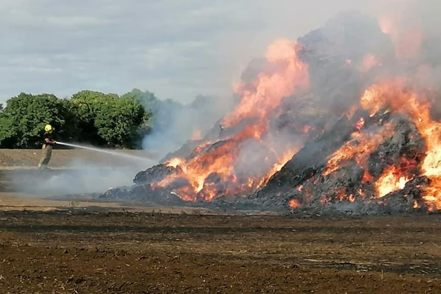 A firefighter tackles the inferno. Image: Bedfordshire Fire and Rescue Service.