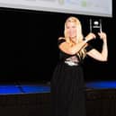 Lauren with her trophy at the SME Luton & Bedfordshire Awards.