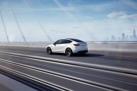 Tesla Model Y on the road. Photo: TESLA