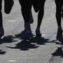 File photo showing a close up of runners. Picture: STAN HONDA/AFP via Getty Images