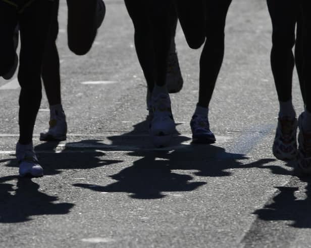 File photo showing a close up of runners. Picture: STAN HONDA/AFP via Getty Images