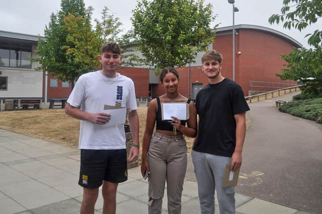 Harrison, Chloe and Jake with their results. Chloe will be studying Veterinary Medicine at university after gaining an A* and two As. Image: BEST