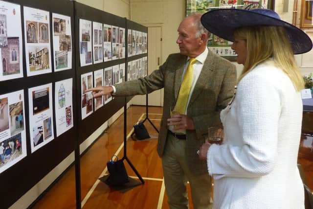 Bruce Deacon, architect from 1985 to 2015, explaining one of the many restoration projects to the Lord-Lieutenant of Bedfordshire, Susan Lousada.