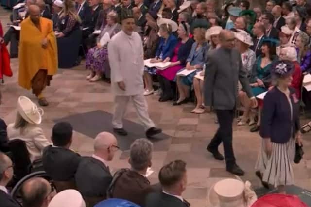 Dr Momen, right in the picture, leads the way in the procession