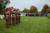 The coffin of Pte McIntosh is carried to the graveside as his family looks on (Crown Copyright)