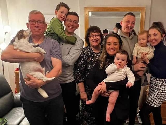 Brothers Graeme and Adam Dilley with family